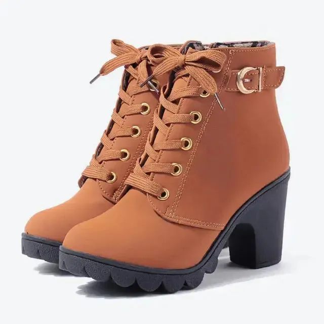 Cross strappy boots